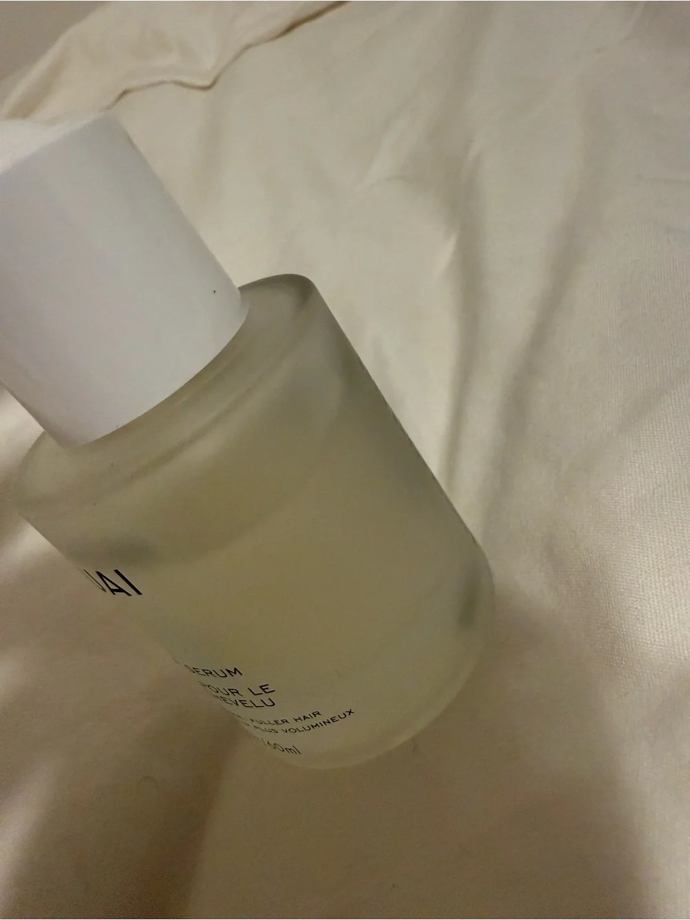 OUAI White Serum Bottle with Frosted Glass and White Cap